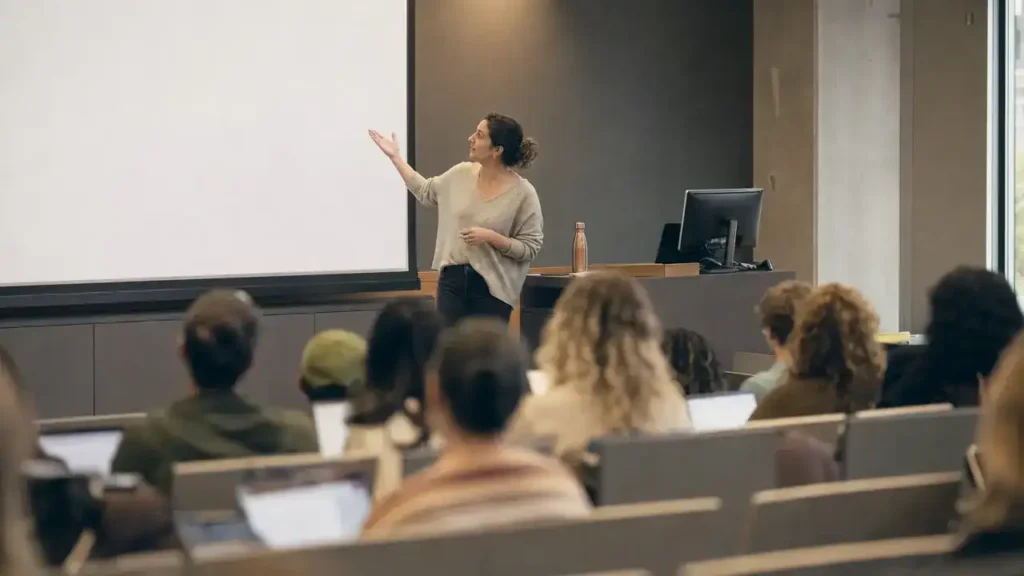 University lecturer teaching students in a Canadian lecture hall