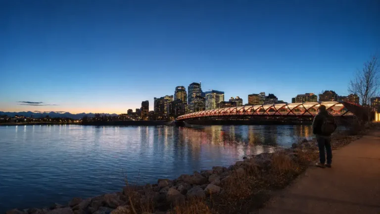 Calgary Peace Bridge at dusk, covering the latest AAIP draws